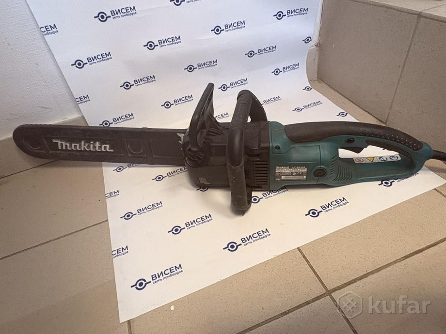Электрическая пила Makita UC 4030 A